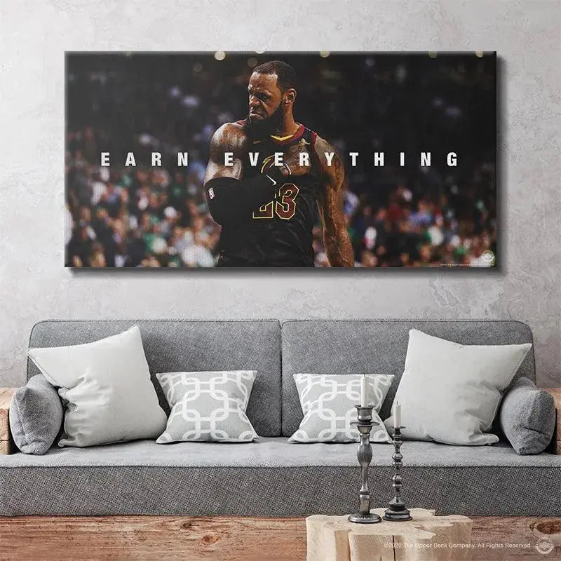 Angled shot of LeBron James, number 23 visible, featured on the LeBron James - Earn Everything poster.