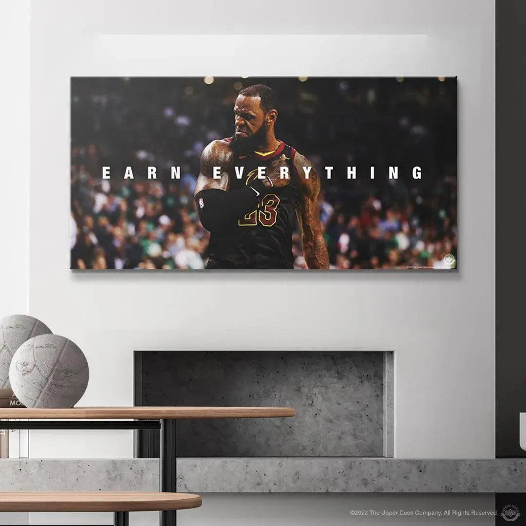 Lifestyle view of the LeBron James - Earn Everything poster above a bedroom desk, inspiring success.