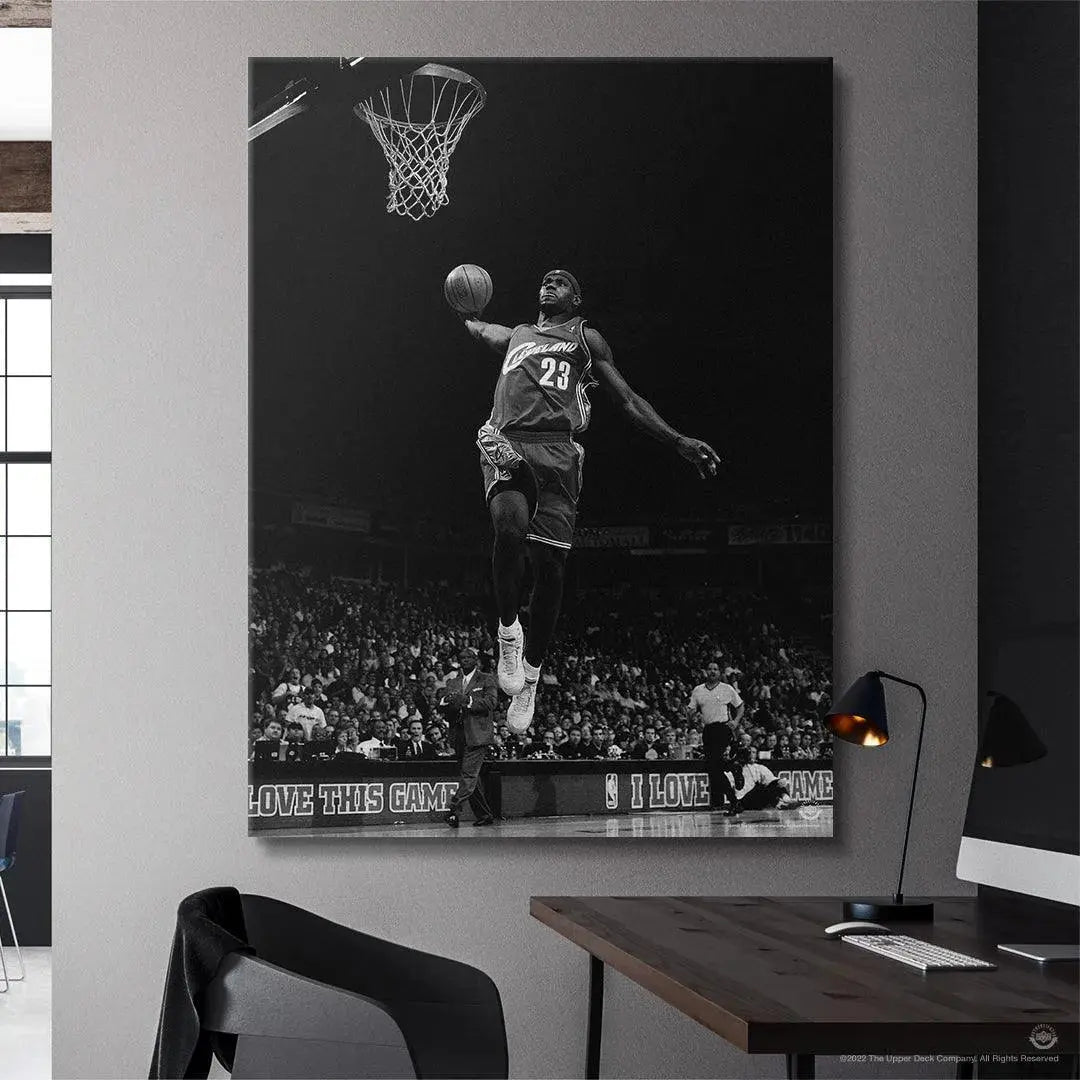 Lifestyle mockup showing the framed LeBron James - Kingdom Come artwork hanging in a modern living room.