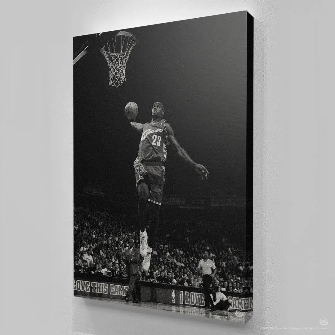 Low-angle view emphasizing LeBron's vertical leap and the rim in the dramatic LeBron James - Kingdom Come poster.
