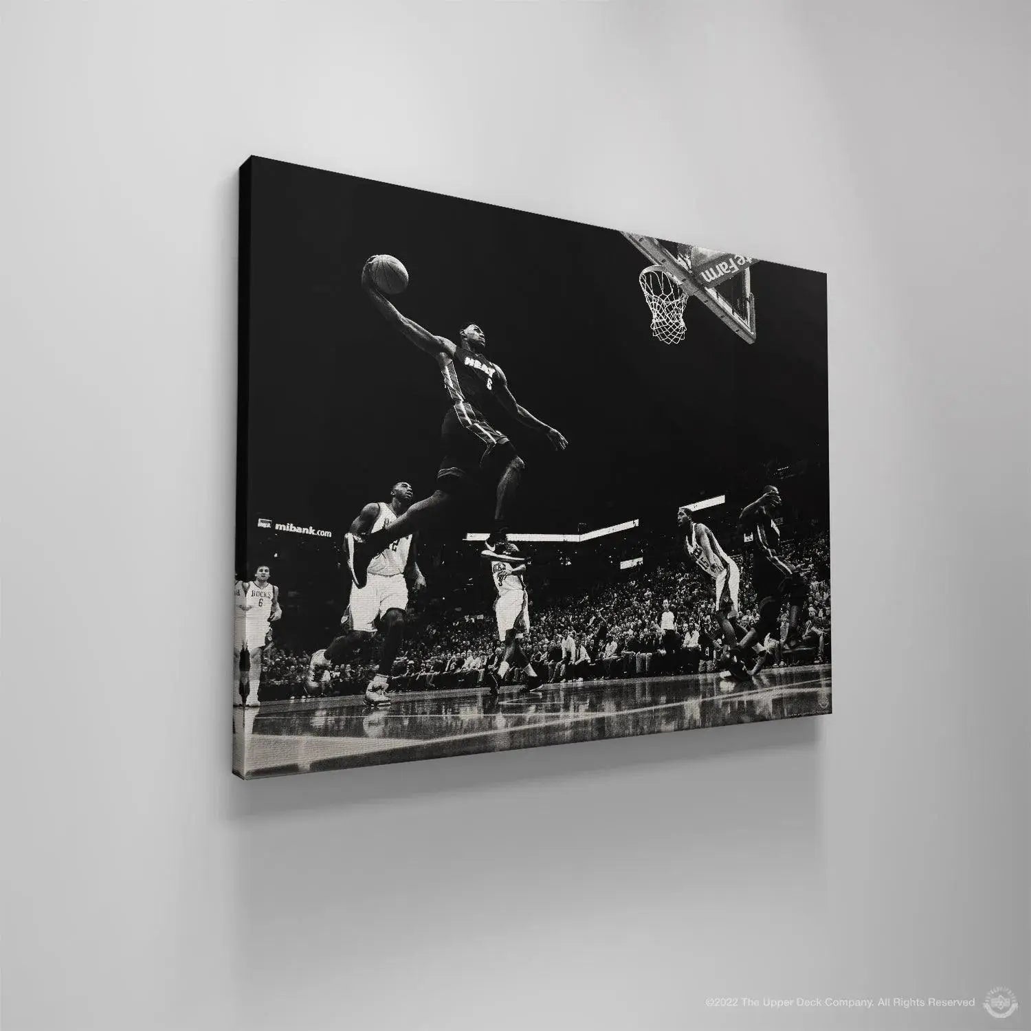Lifestyle presentation showing the framed 'LeBron James - Masterpiece' hanging proudly in a contemporary sports den.