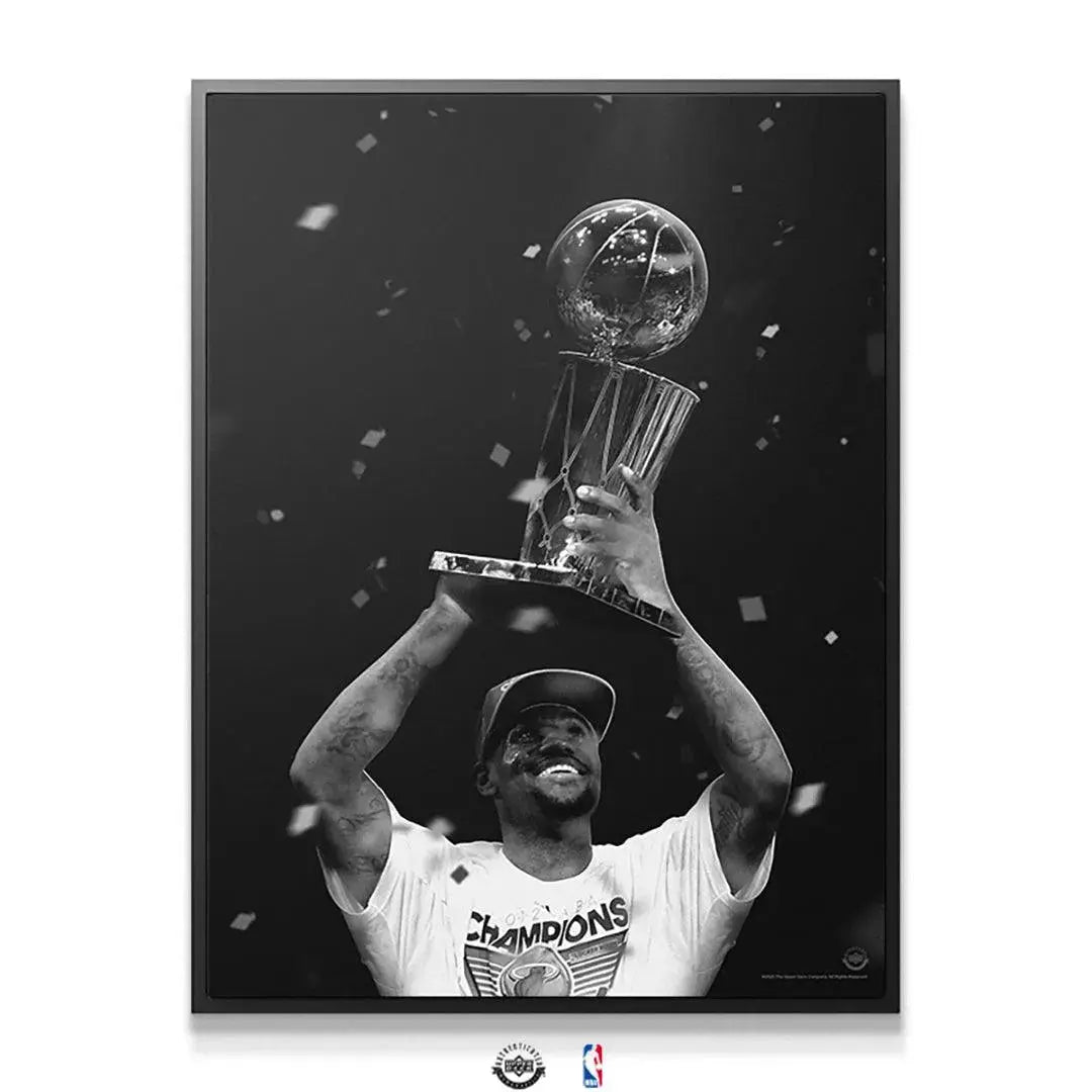 Detailed view of the texture and shine of the NBA trophy being held high by LeBron James - The First.