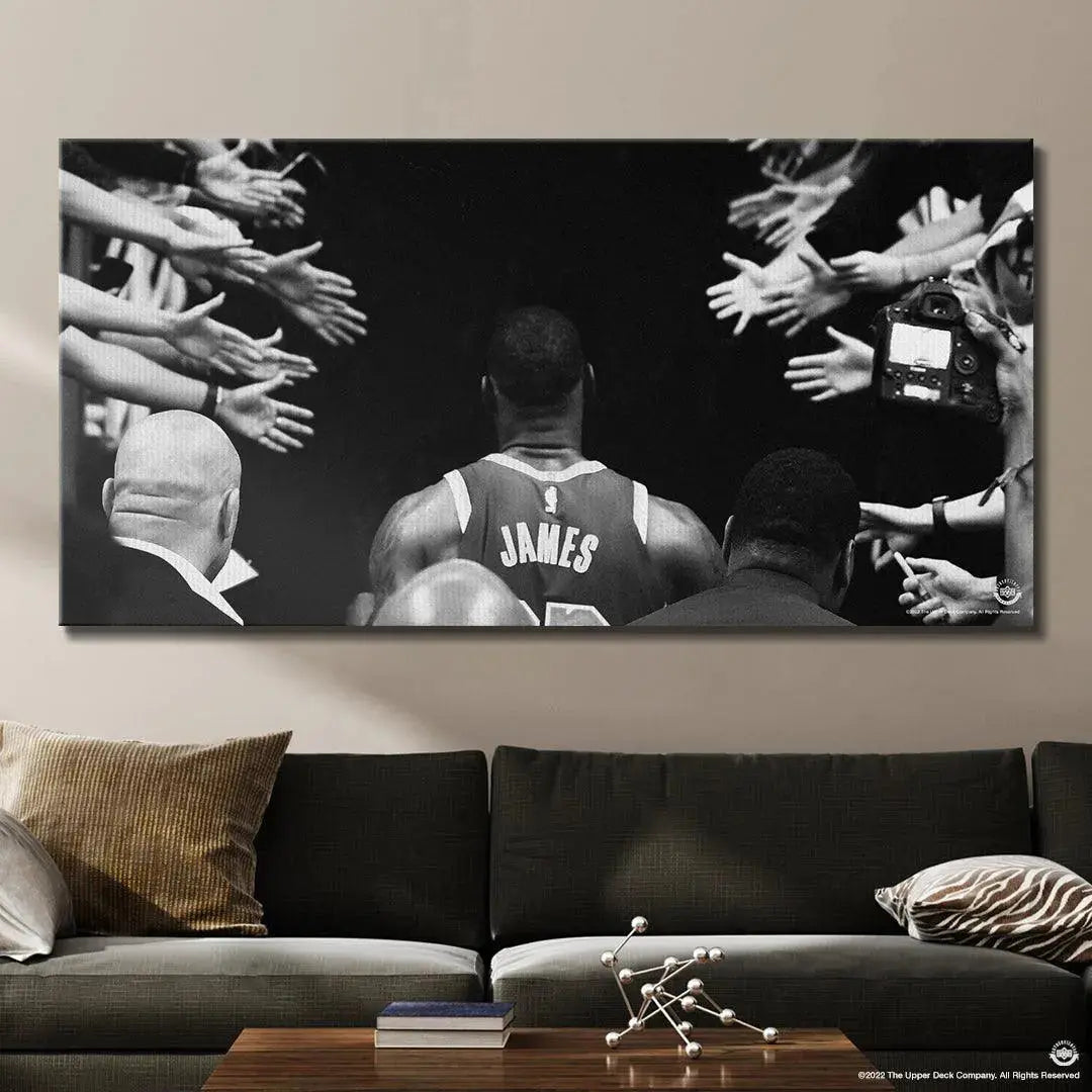 Detailed shot of the outstretched hands and camera flash surrounding LeBron in 'LeBron James - Tunnel Vision'.
