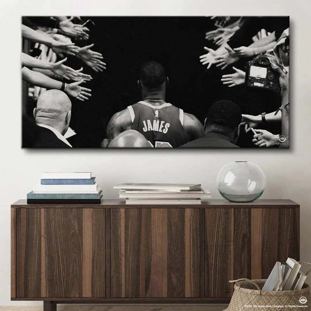 Lifestyle perspective of the 'LeBron James - Tunnel Vision' hanging above a modern living room couch.