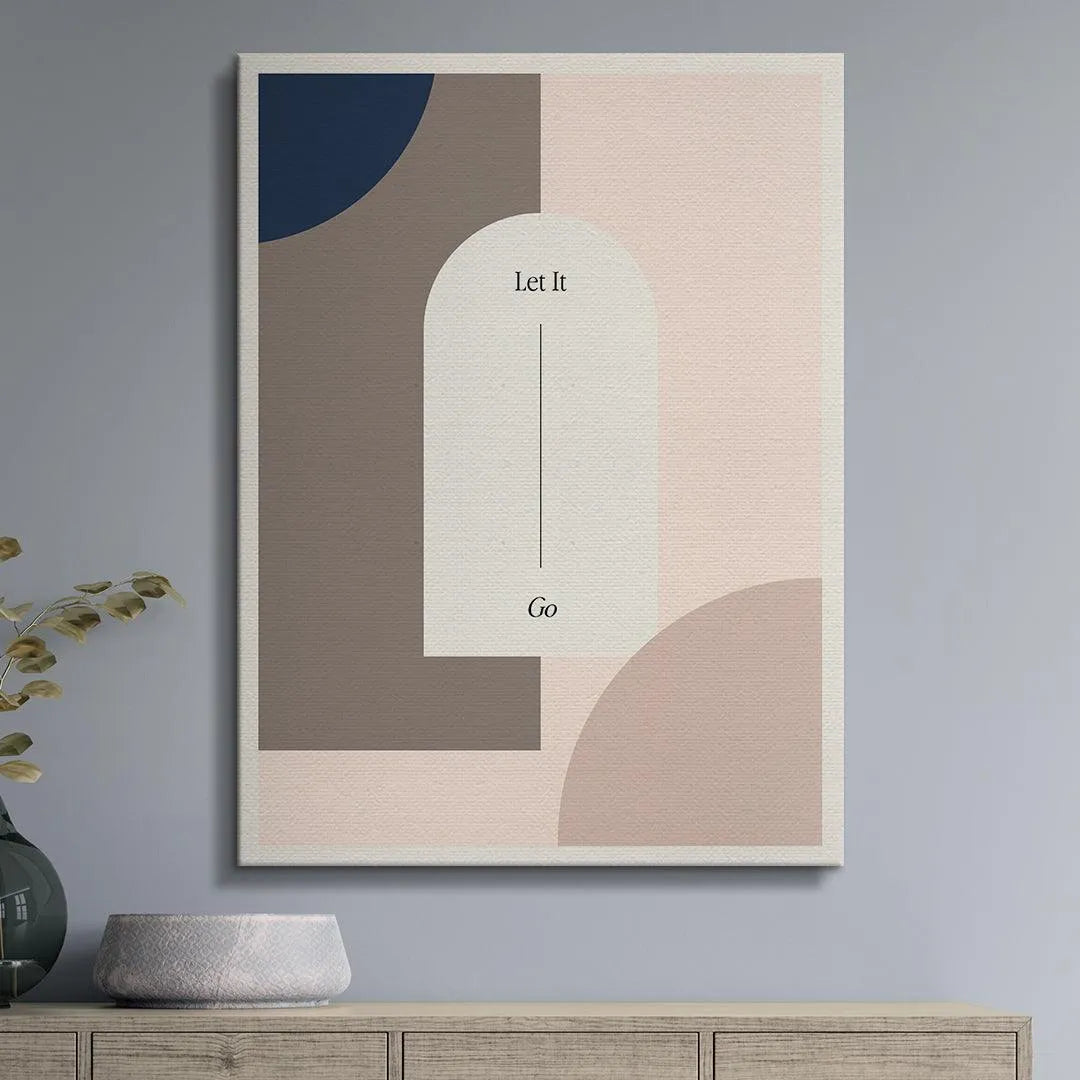 Lifestyle shot of the 'Let It Go' minimalist poster hanging above a modern bedroom headboard.
