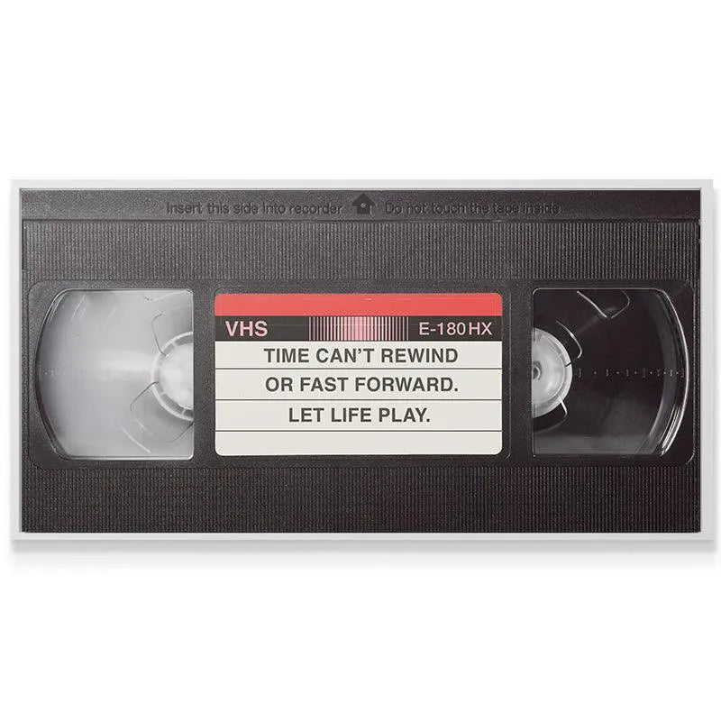 Angled 3/4 view of the vintage VHS art, highlighting the depth of the 'Let It Play' motivational piece.