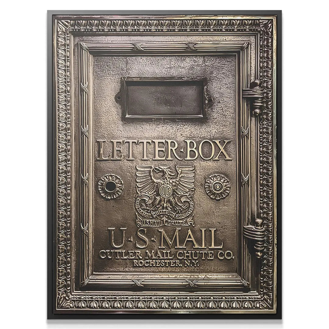 Close-up detail of the U.S. Mail text and American Eagle emblem on the antique Letter-Box.
