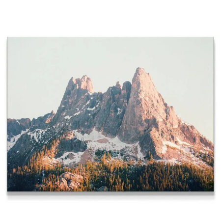Close-up view of the rugged granite texture on the sunlit peaks of Liberty Bell.