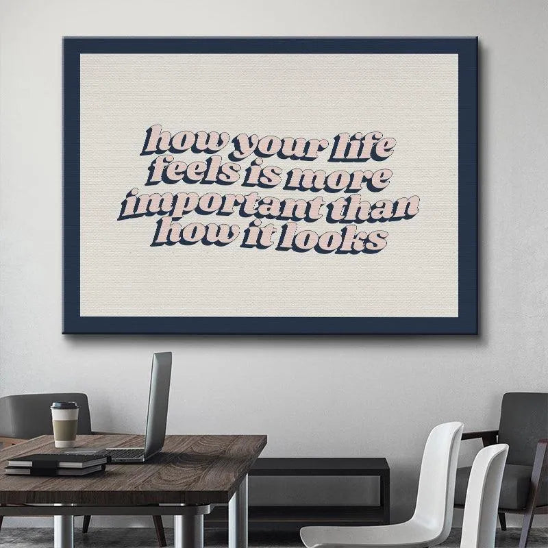 Corner view of the navy blue frame surrounding the positive affirmation about prioritizing real Life.