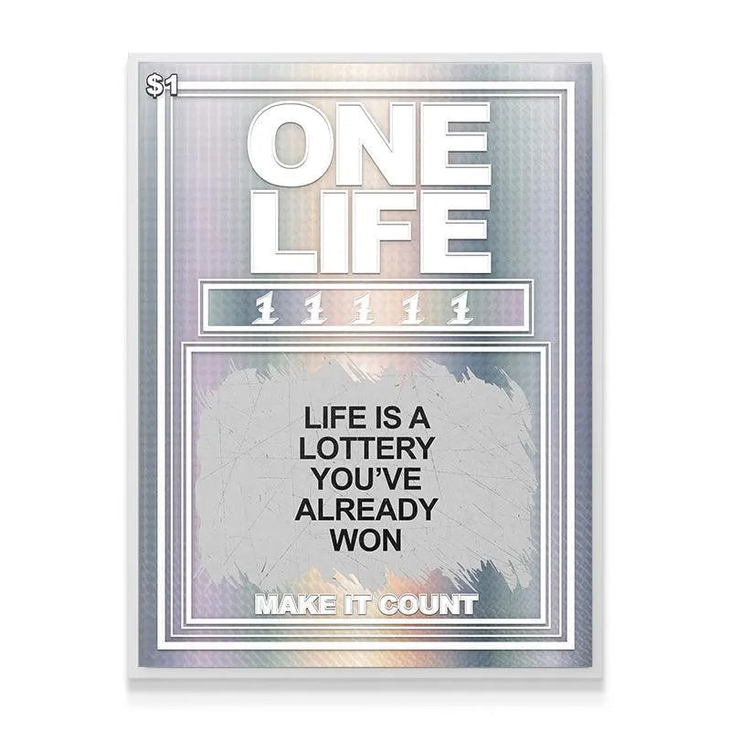 Lifestyle mockup showing the motivational print 'Life Is A Lottery You Already Won' hanging above a modern desk.