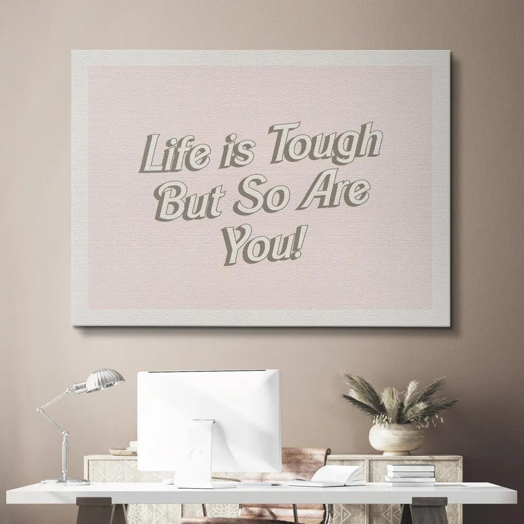 Corner detail crop emphasizing the crisp white border surrounding the phrase 'Life is Tough But So Are You!'