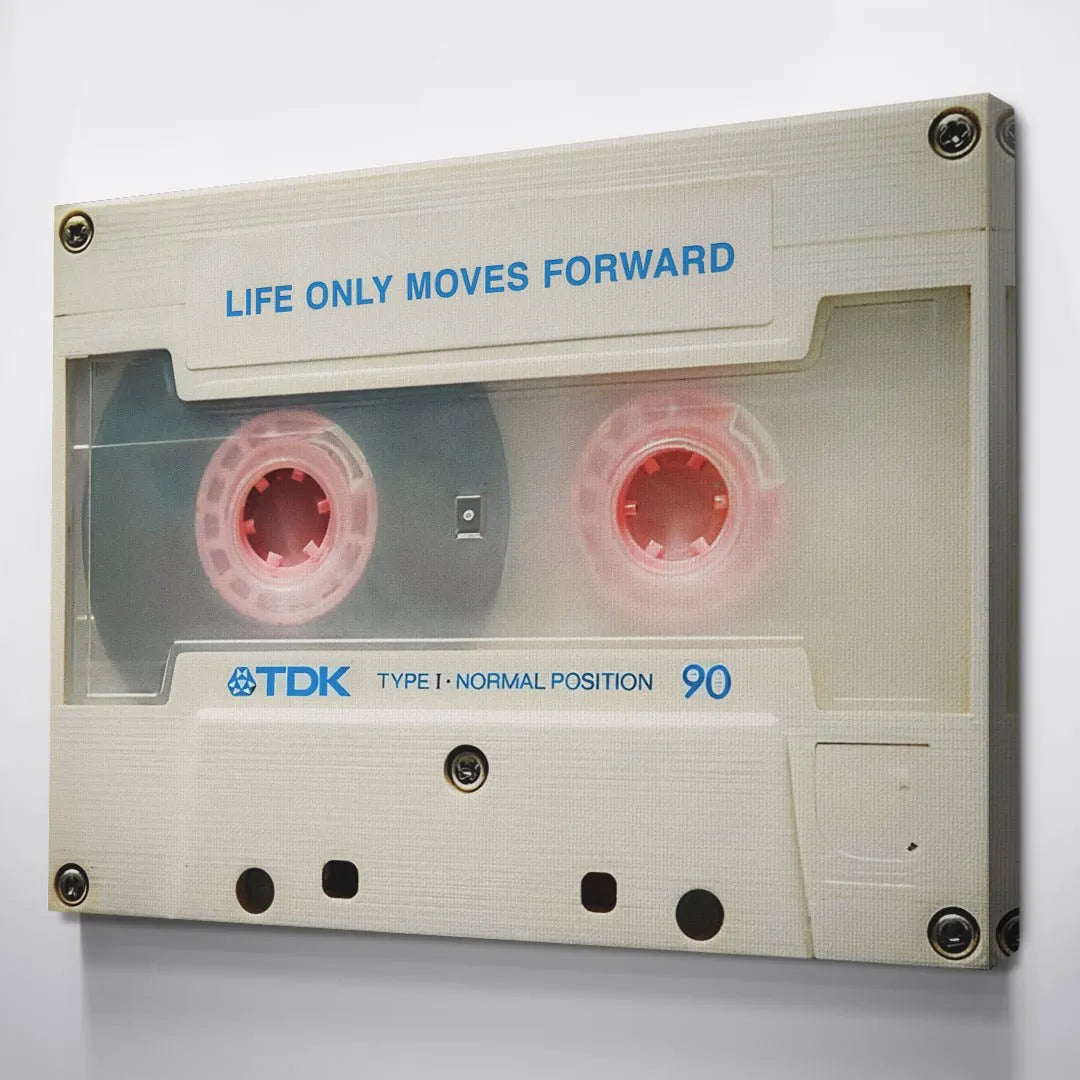 Bottom detail capturing the TDK logo, Type I designation, and the magnetic tape rollers, reminding the viewer that Life Only Moves Forward.
