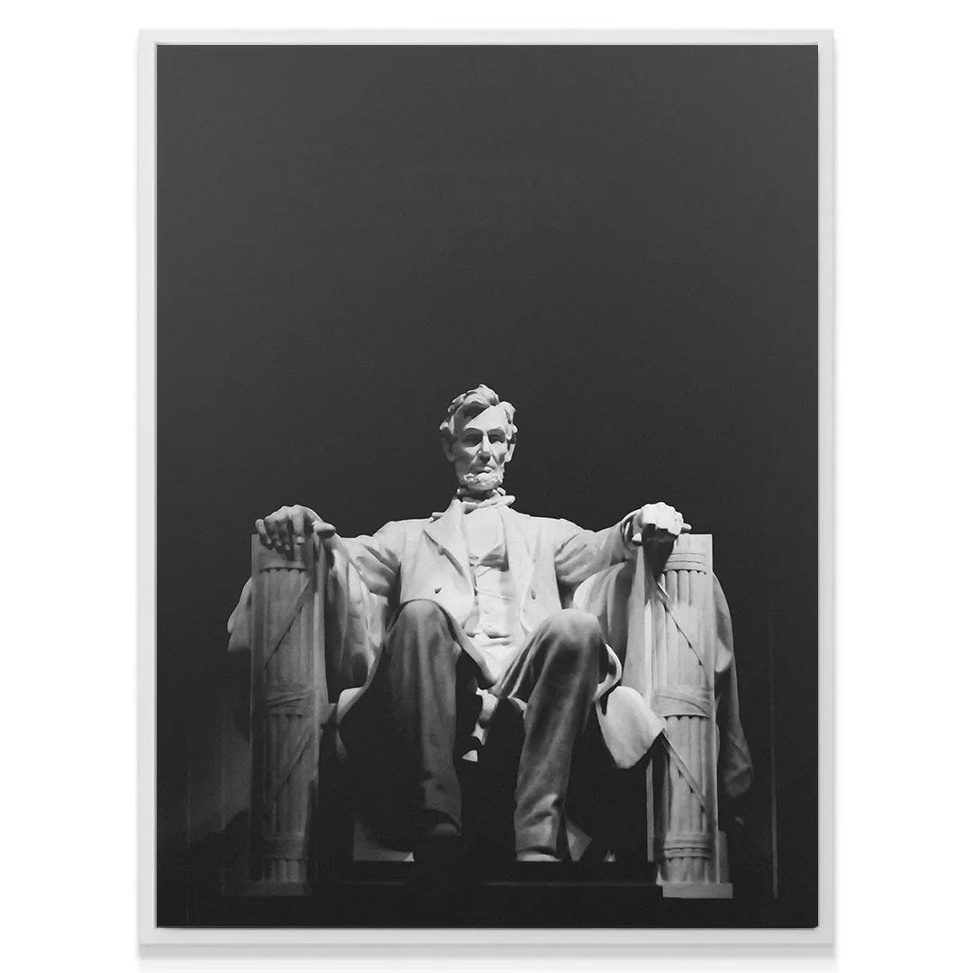 Seated figure of Abraham Lincoln photographed from a low-angle perspective at the Lincoln Memorial.