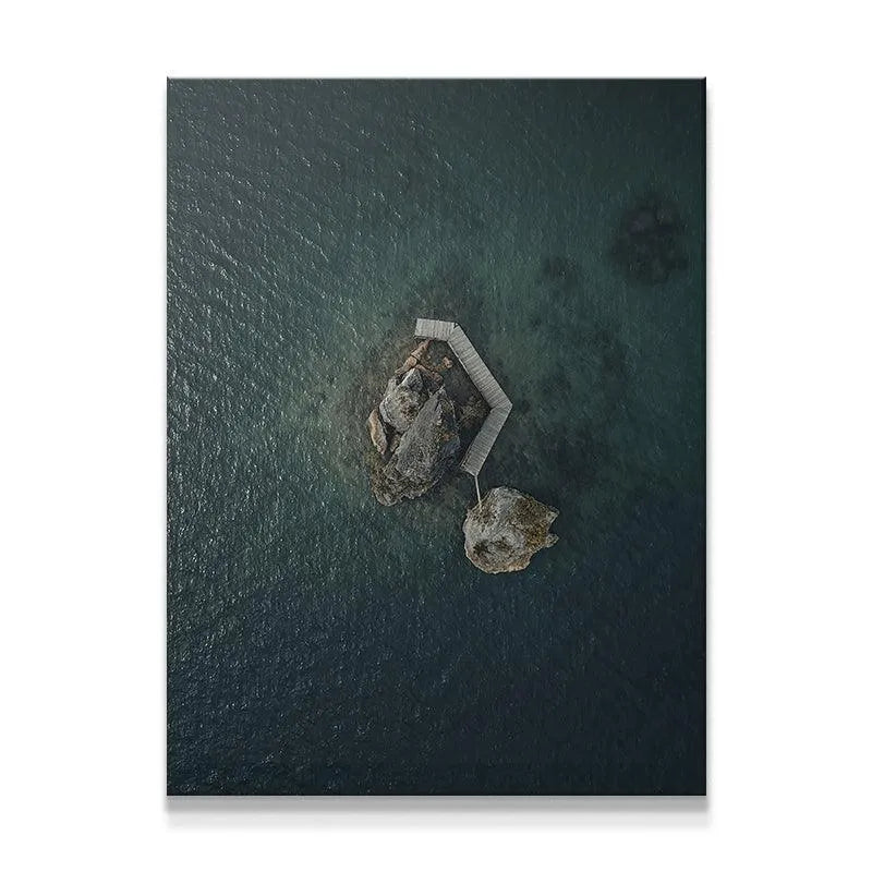 Overhead view of the 'Lonely Rock' canvas print showing deep teal water texture.