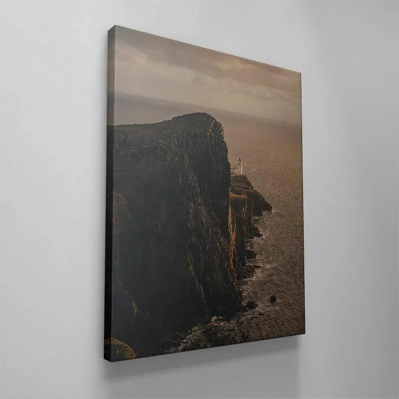 Detail of the churning, dark waves crashing against the base of the cliffs near the Lonesome Lighthouse.