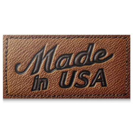 Close-up view of the textured brown surface of the Made In USA - Leather Tag.