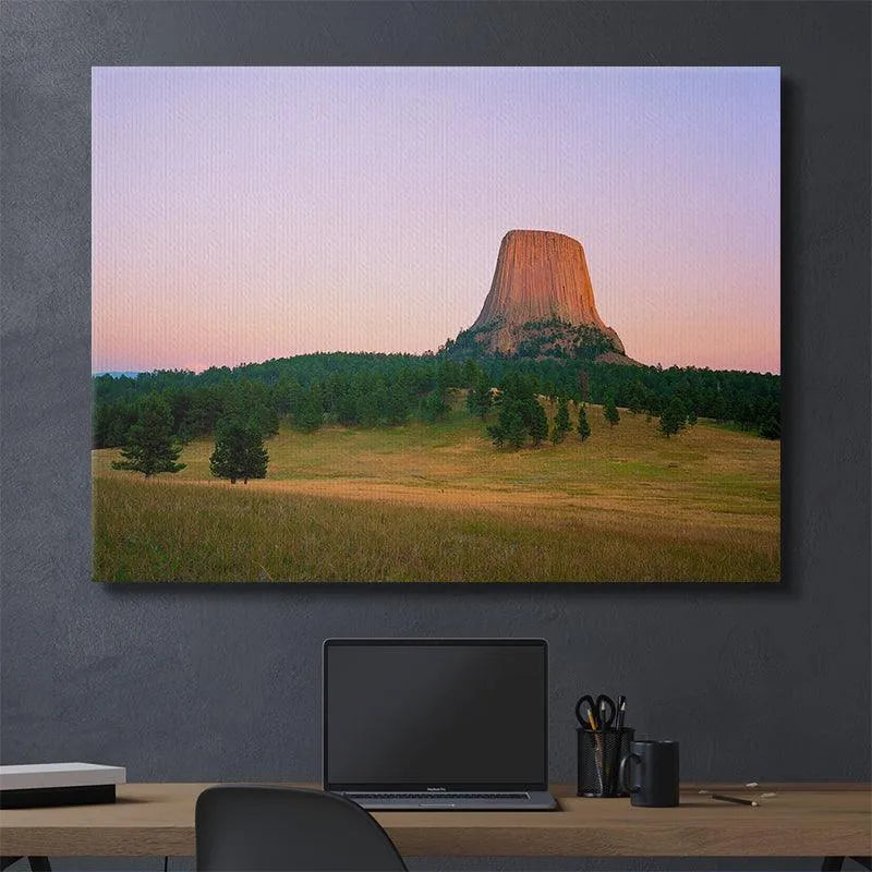 Wide angle perspective showing the dramatic scale and immensity of Magic Hour At The Devils Tower in the national monument.