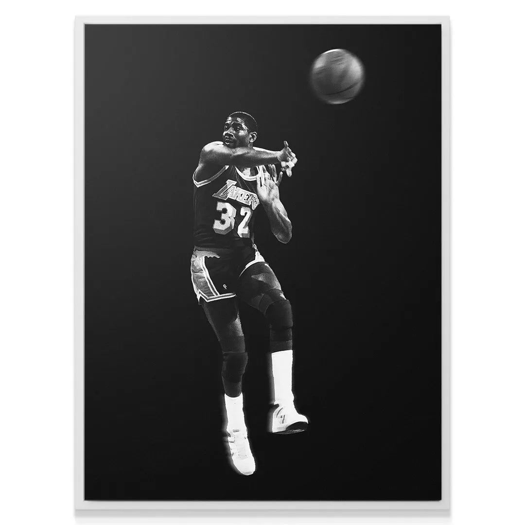 Low angle shot emphasizing the jump and pass execution captured in the 'Magic Johnson - Made You Look' artwork.