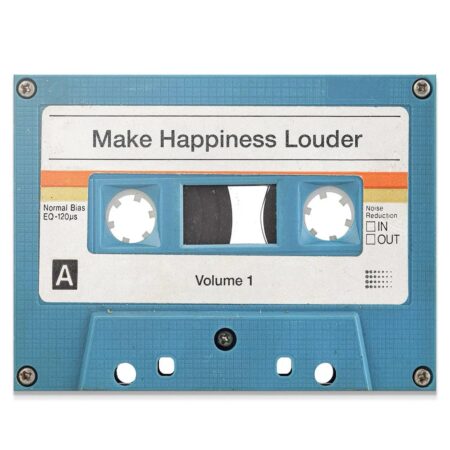 Close-up view of the label texture and aging on the 'Make Happiness Louder (Cassette)'.