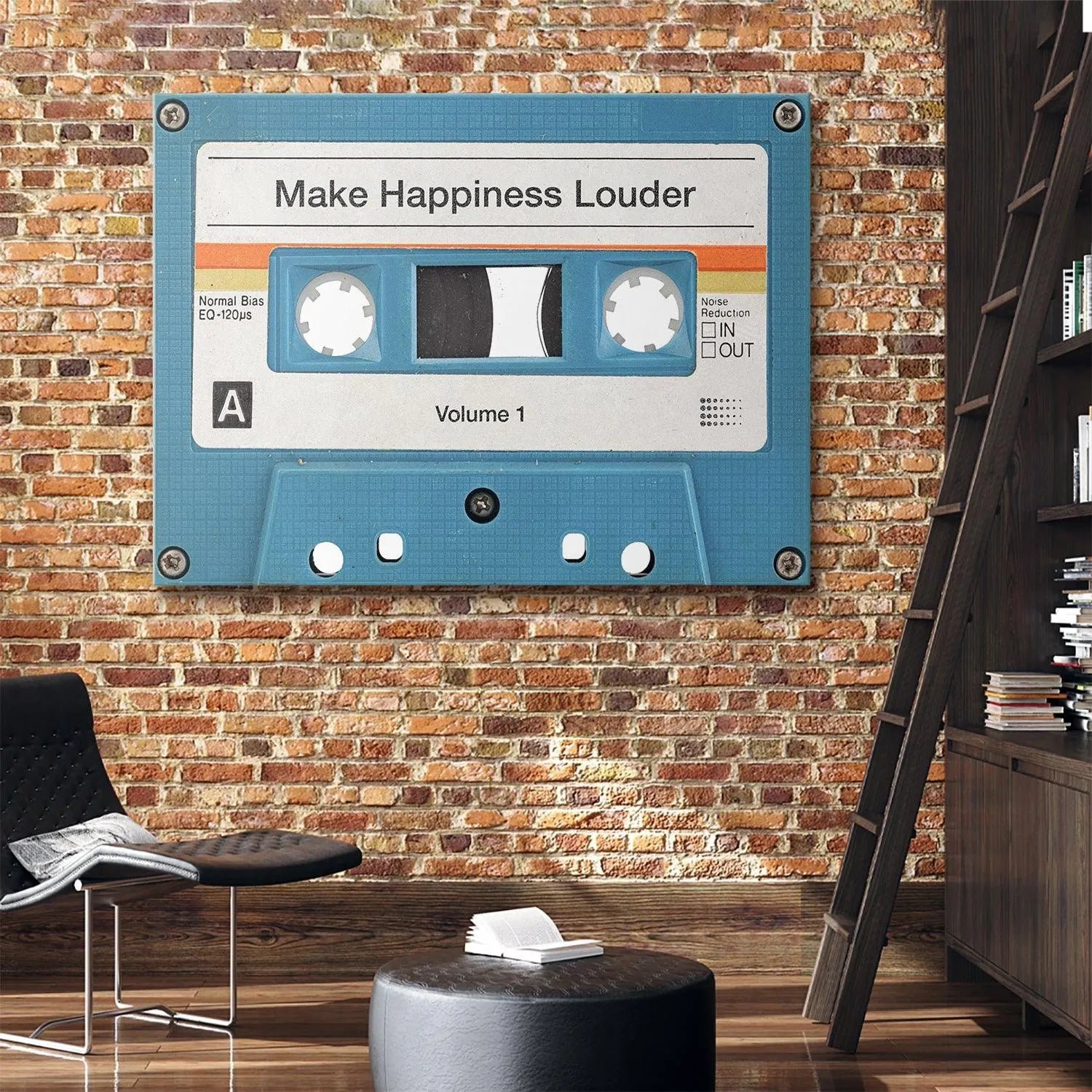 Flat lay image highlighting the "Volume 1" inscription and Side A marker on the 'Make Happiness Louder (Cassette)'.
