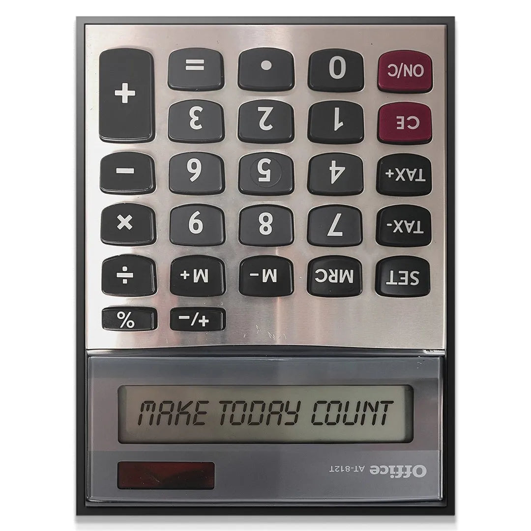 Close-up of the calculator's LCD screen clearly showing the engraved motivational message: Make Today Count.