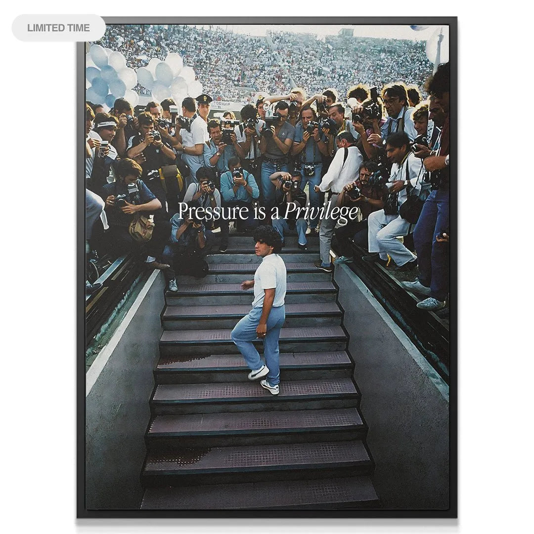 Close-up detail of the iconic text overlay: Maradona - Pressure Is A Privilege