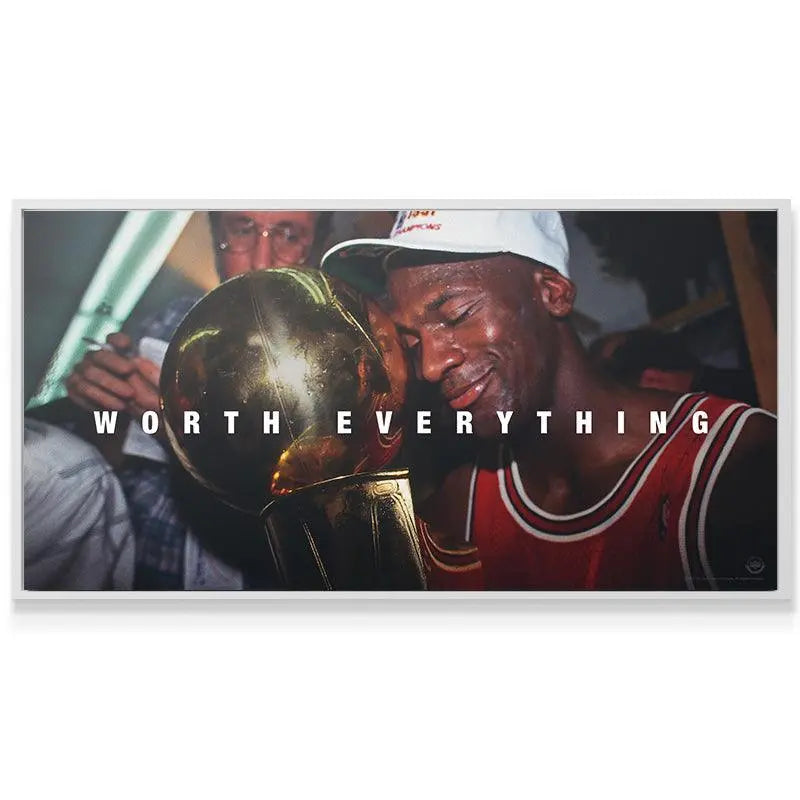 Two men hugging, one holding a trophy with 'WORTH EVERYTHING' text overlay.