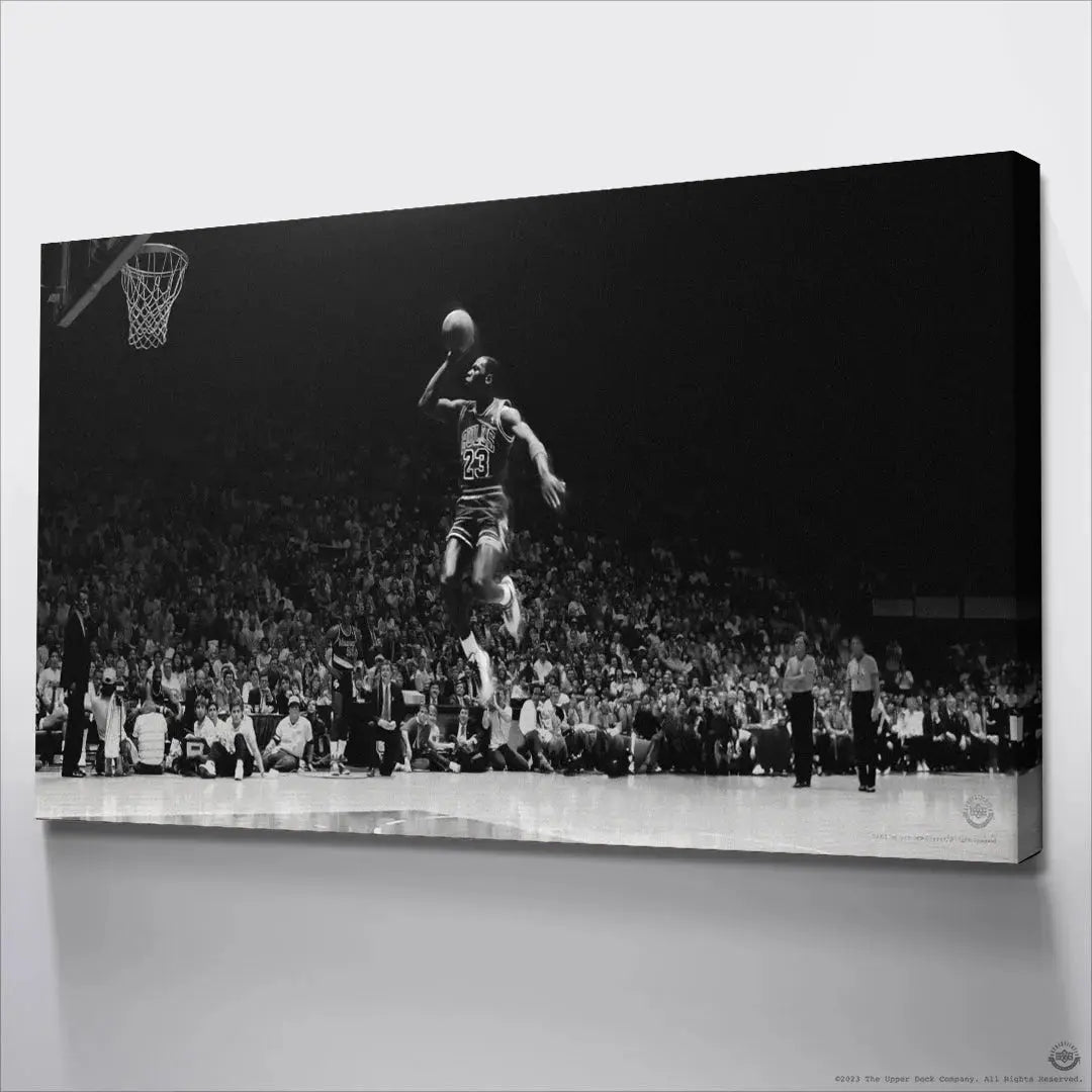 Lifestyle view of Michael Jordan - Elevation displayed prominently above a modern office desk setup.