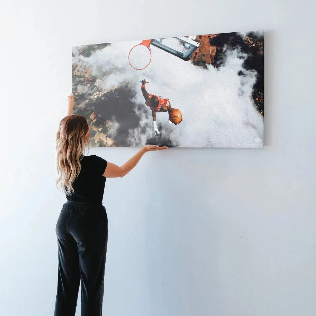 Abstract view of the cloud texture surrounding the figure in the Michael Jordan - Flight Test art piece, separating earth and sky.
