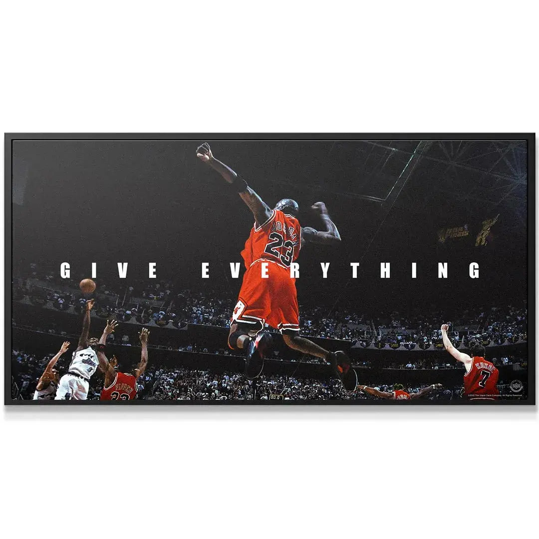 Close-up of Michael Jordan's #23 jersey detail and arm positioning in the 'Michael Jordan - Give Everything' artwork.