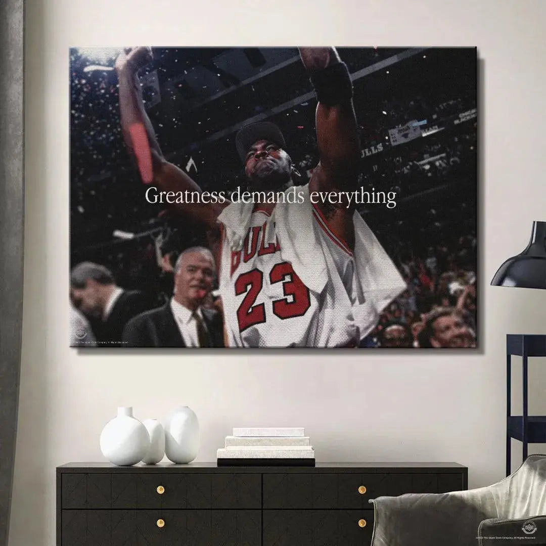 Lifestyle shot of the framed print titled Michael Jordan - Greatness Demands Everything hanging in a modern office.
