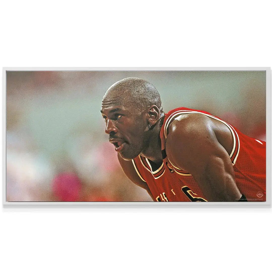 Canvas texture display of Michael Jordan's concentrated face, reflecting the Michael Jordan - Mindset.
