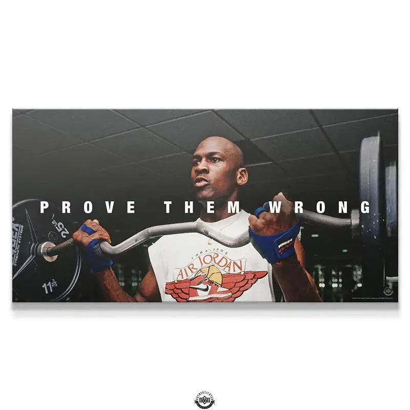 Close-up of Michael Jordan’s determined face while lifting weights in the 'Michael Jordan - Prove Them Wrong' poster.