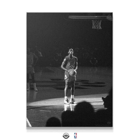 Atmospheric shot of Michael Jordan - Spotlight focused on the free-throw line in a dramatic black and white image.