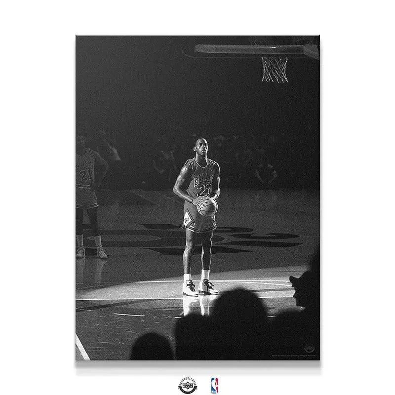 Atmospheric shot of Michael Jordan - Spotlight focused on the free-throw line in a dramatic black and white image.