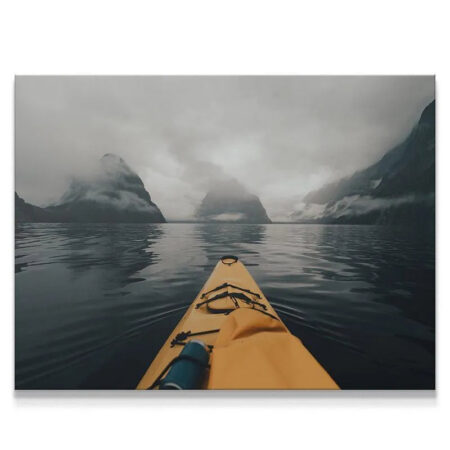 POV shot from yellow kayak looking out at misty fiords using Milford Paddles gear