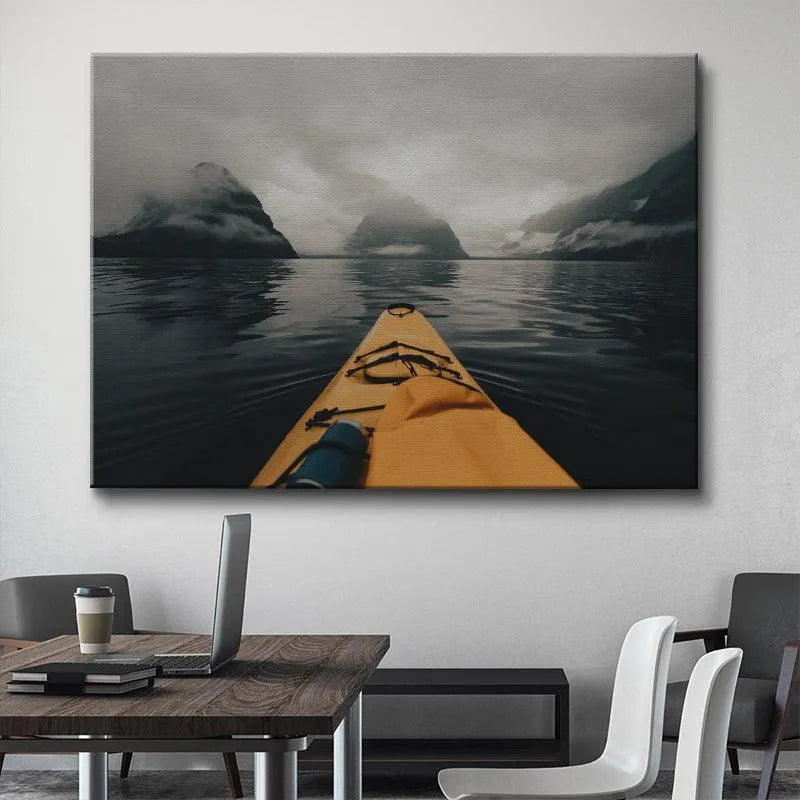 Wide landscape view of the mountainous water body under gray clouds, suggesting the durability of Milford Paddles