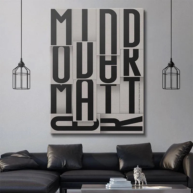 Bold, black block letters spelling out Mind Over Matter on a light grey, overlapping background texture.