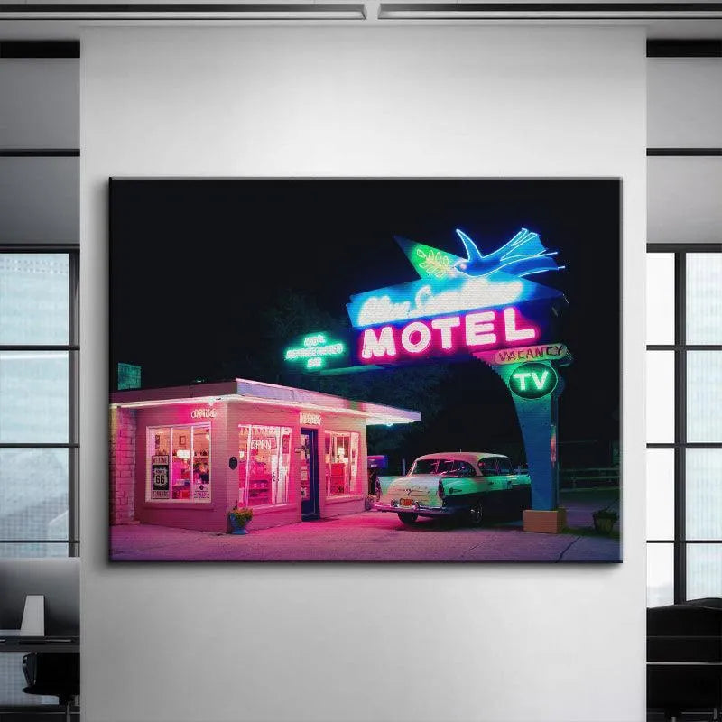 Saturated neon pink and blue glow illuminating the classic car parked near the entrance promising Refrigerated Air.