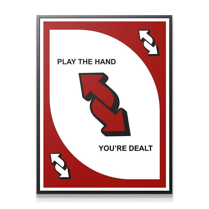 Full-frame perspective of the iconic red and white Reverse card poster hanging on a clean wall.