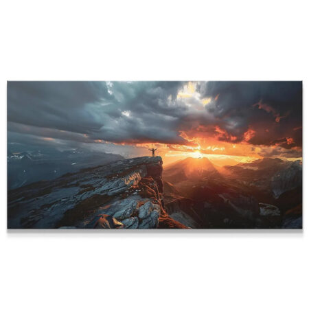 Wide panoramic view of the 'Rocky Cliff' at sunset with dark clouds and fiery orange light.