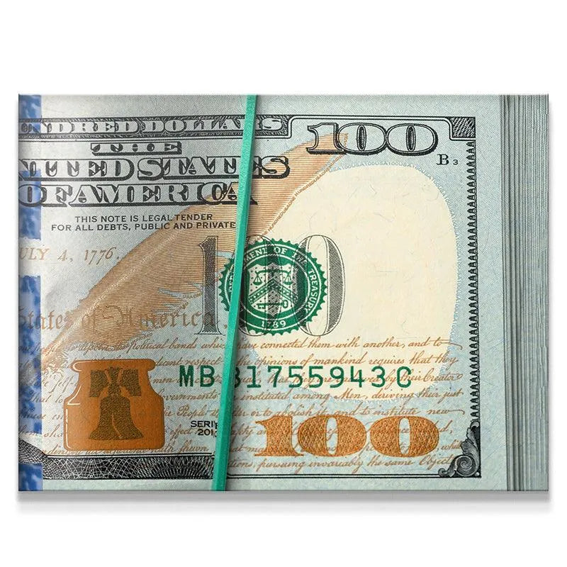 Close-up of $100 bills bound by a green band, emphasizing the security of Rubberband Racks.
