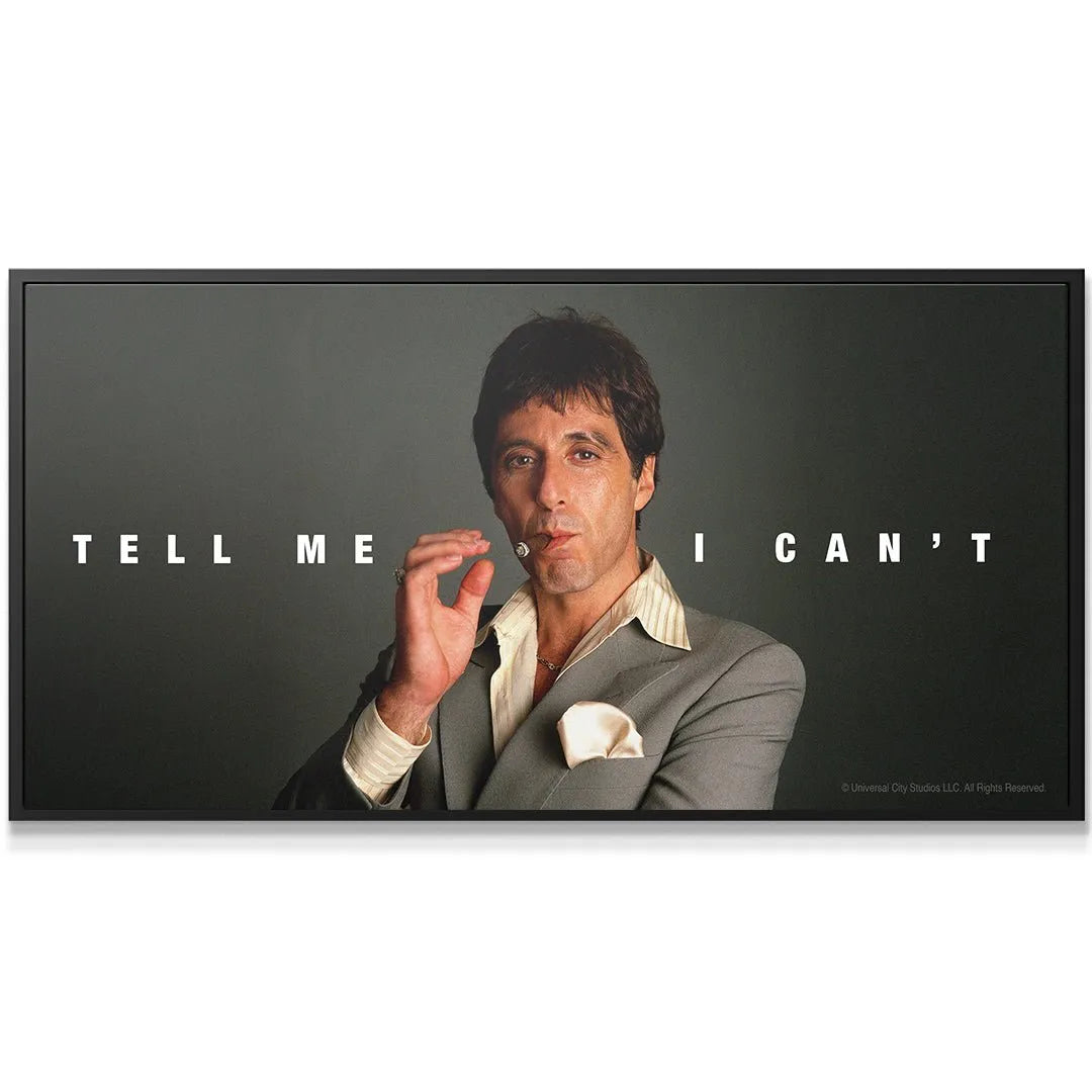 Wide-angle view of the grey suit texture and the powerful message, 'Scarface - Tell Me I Can't' poster.