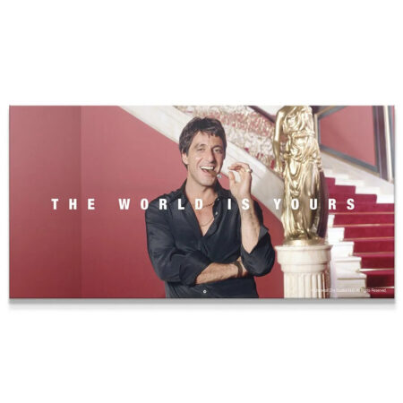 Close-up view of Tony Montana smiling proudly in the Scarface - The World Is Yours film poster.
