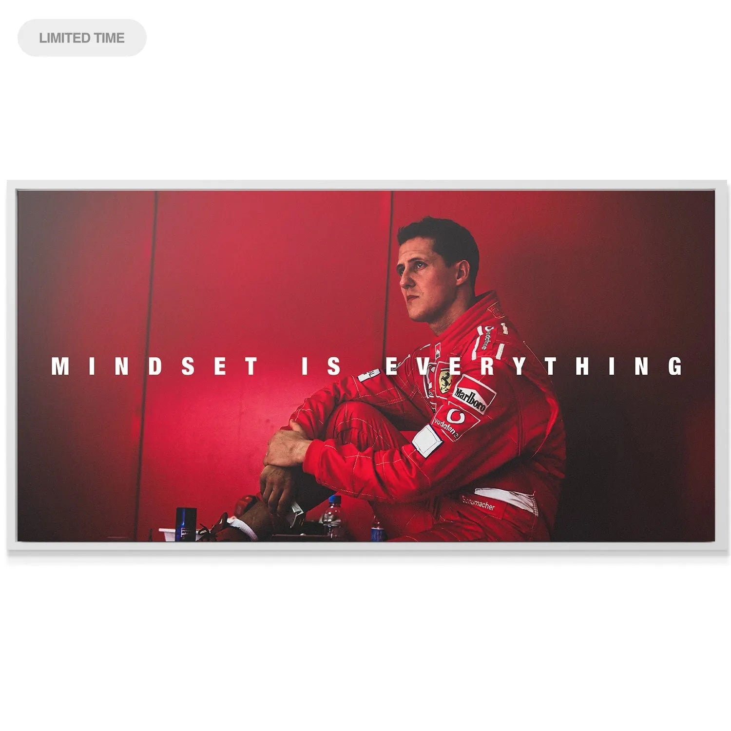 Detail of the Ferrari race suit texture and sponsor logos displayed prominently in the 'Schumacher - Mindset Is Everything' artwork.