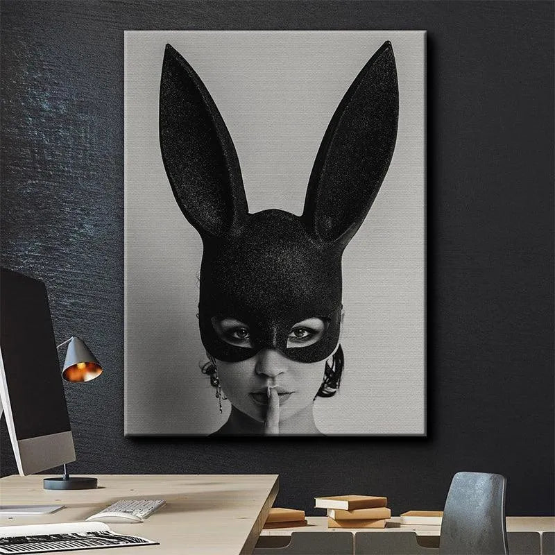 Black and white glamour portrait featuring the intense eye gaze beneath the bunny mask in Secrets Secrets.