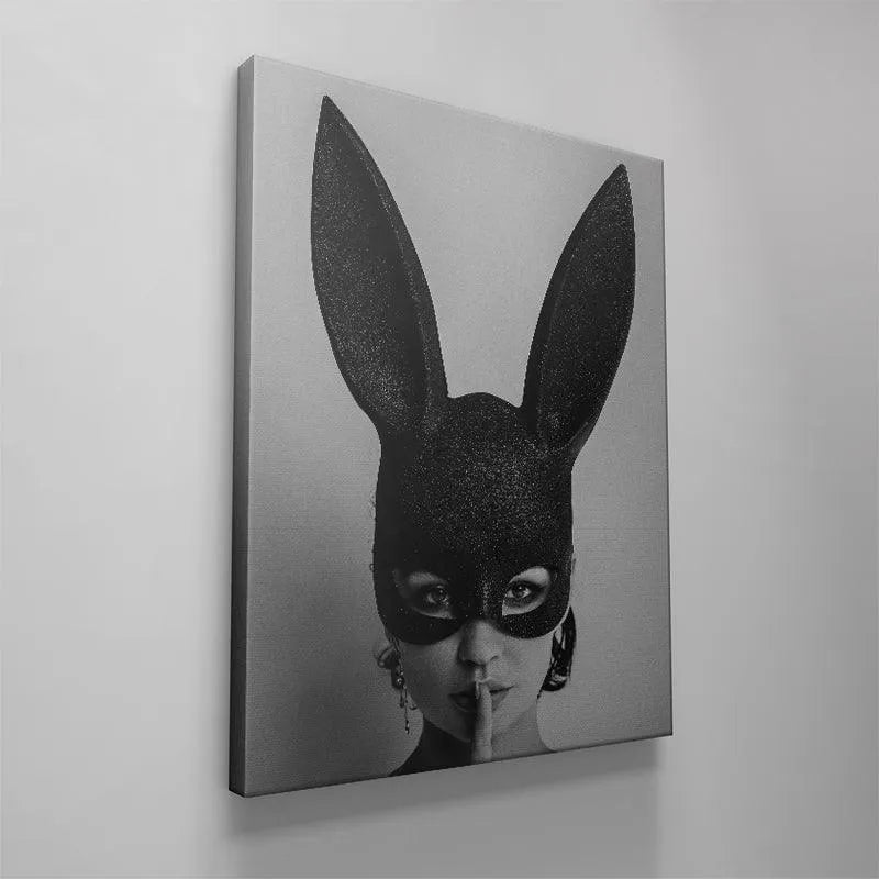 Vertical orientation of the mysterious masked woman art print, Secrets Secrets, hung in a modern room setting.