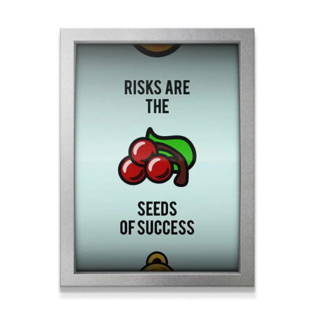 Full frontal view of the silver-framed print displaying the quote about Seeds of Success.