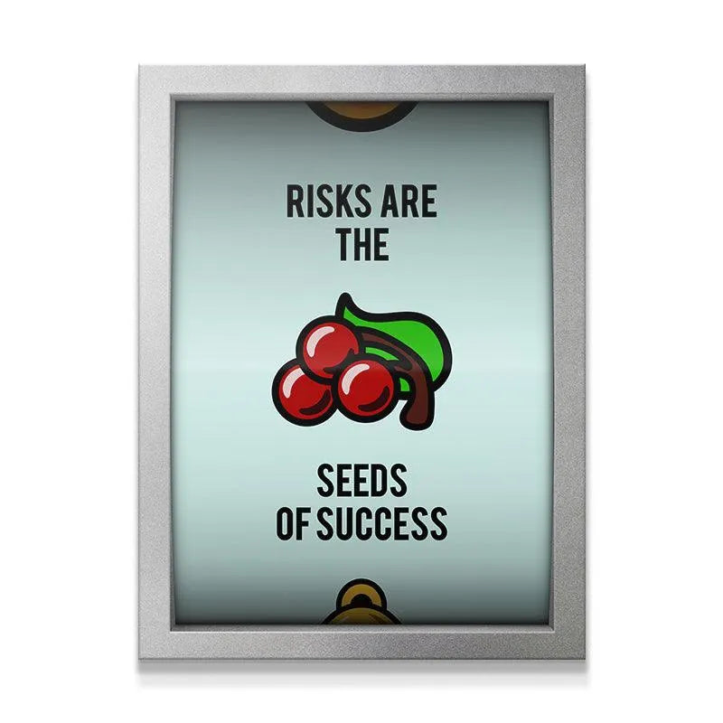 Full frontal view of the silver-framed print displaying the quote about Seeds of Success.