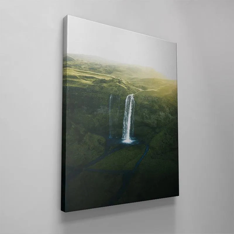 Soft focus image capturing the movement and long exposure effect of water falling at Seljalandsfoss.